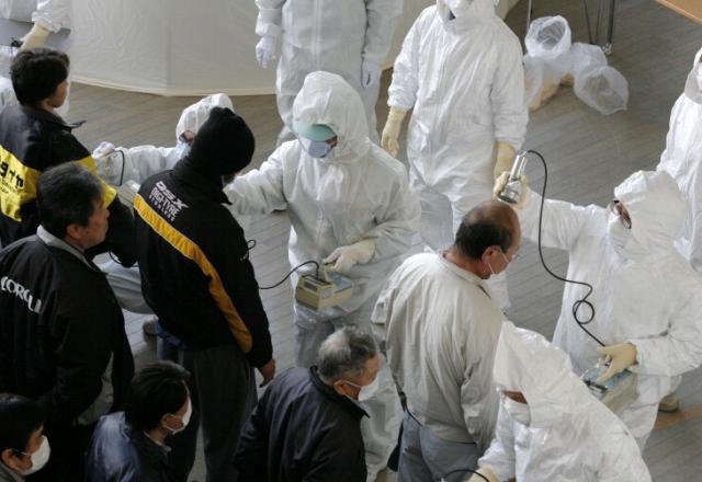 Número de mortos em catástrofe no Japão passa de 5,1 mil, informa polícia Go Takayama/AFP Número de mortos em catástrofe no Japão passa de 5,1 mil, informa polícia Go Takayama/AFP