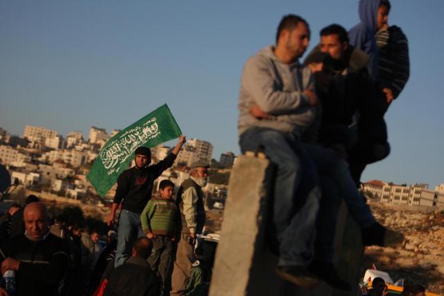 Israel liberta 550 presos palestinos em troca de soldado Shalit Abbas Momani/AFP Israel liberta 550 presos palestinos em troca de soldado Shalit Abbas Momani/AFP