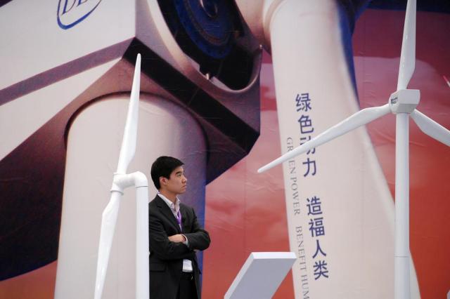 Cidade chinesa de Gansu concentra esforços em energia renovável Peter PARKS/AFP Cidade chinesa de Gansu concentra esforços em energia renovável Peter PARKS/AFP