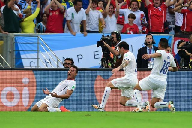 Com gols de Vargas e Aránguiz, Chile vence e elimina a Espanha Martin Bernetti/AFP