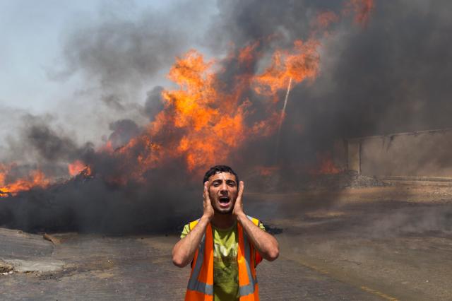 Ataques israelenses matam 30 palestinos na Faixa de Gaza Mahmud Hams / AFP/ Ataques israelenses matam 30 palestinos na Faixa de Gaza Mahmud Hams / AFP/
