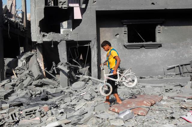 Novo ataque contra escola da ONU mata 10 palestinos em Gaza Said Khatib/AFP Novo ataque contra escola da ONU mata 10 palestinos em Gaza Said Khatib/AFP