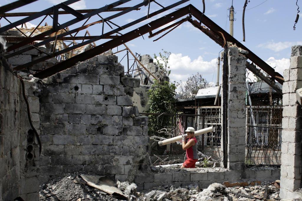 Ataque aéreo atinge reduto de separatistas na Ucrânia war-torn east Ukraine,the city council said. AFP PHOTO//AFP Ataque aéreo atinge reduto de separatistas na Ucrânia war-torn east Ukraine,the city council said. AFP PHOTO//AFP