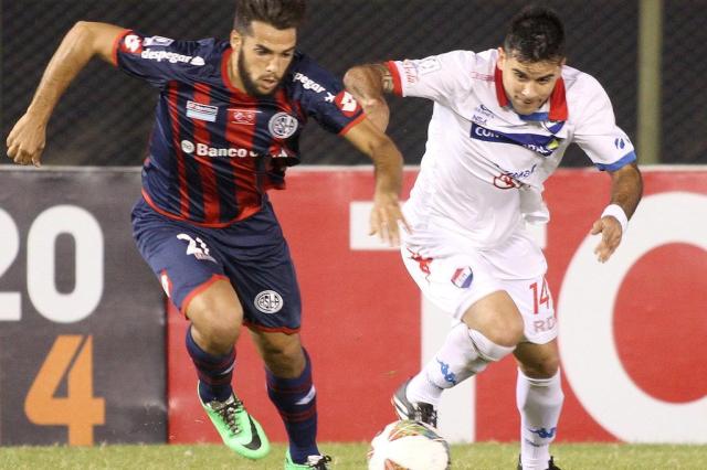 No último lance, Nacional-PAR empata com San Lorenzo na decisão da Libertadores ENRIQUE ZARZA/AFP No último lance, Nacional-PAR empata com San Lorenzo na decisão da Libertadores ENRIQUE ZARZA/AFP