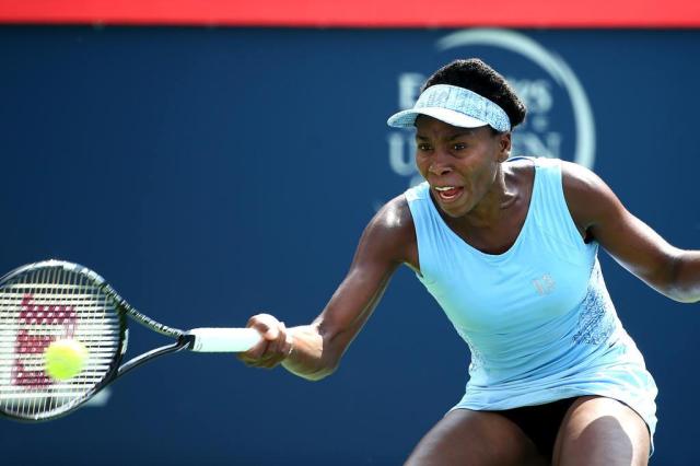 Em partida familiar, Venus surpreende Serena no Premier de Montreal Streeter Lecka/AFP Em partida familiar, Venus surpreende Serena no Premier de Montreal Streeter Lecka/AFP