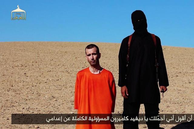 Extremistas do Estado Islâmico anunciam nova decapitação ISIS/Reprodução Extremistas do Estado Islâmico anunciam nova decapitação ISIS/Reprodução