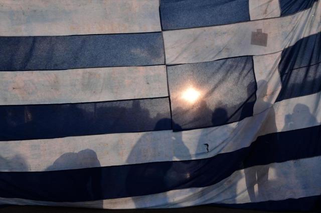 Entenda o que levou a Grécia a chegar ao fundo do poço LOUISA GOULIAMAKI/AFP